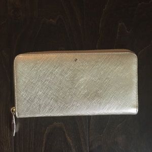 Kate Spade gold zip around wallet